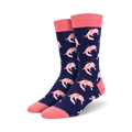 Pair of navy blue crew socks with a repeating pattern of pink axolotls.  The socks have coral pink cuffs.
