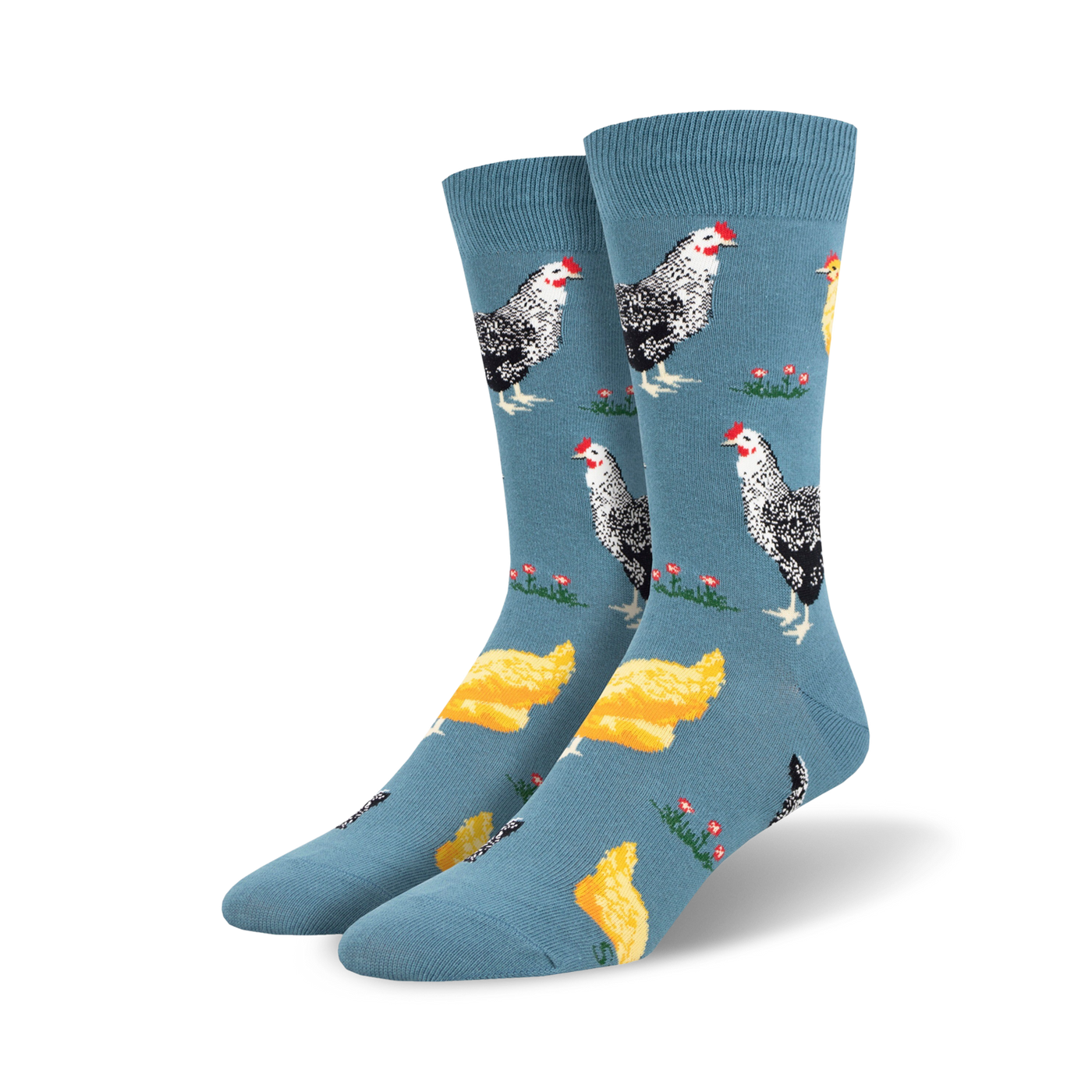 Pair of crew socks; blue background with illustrated black and white hens and yellow chicks. 