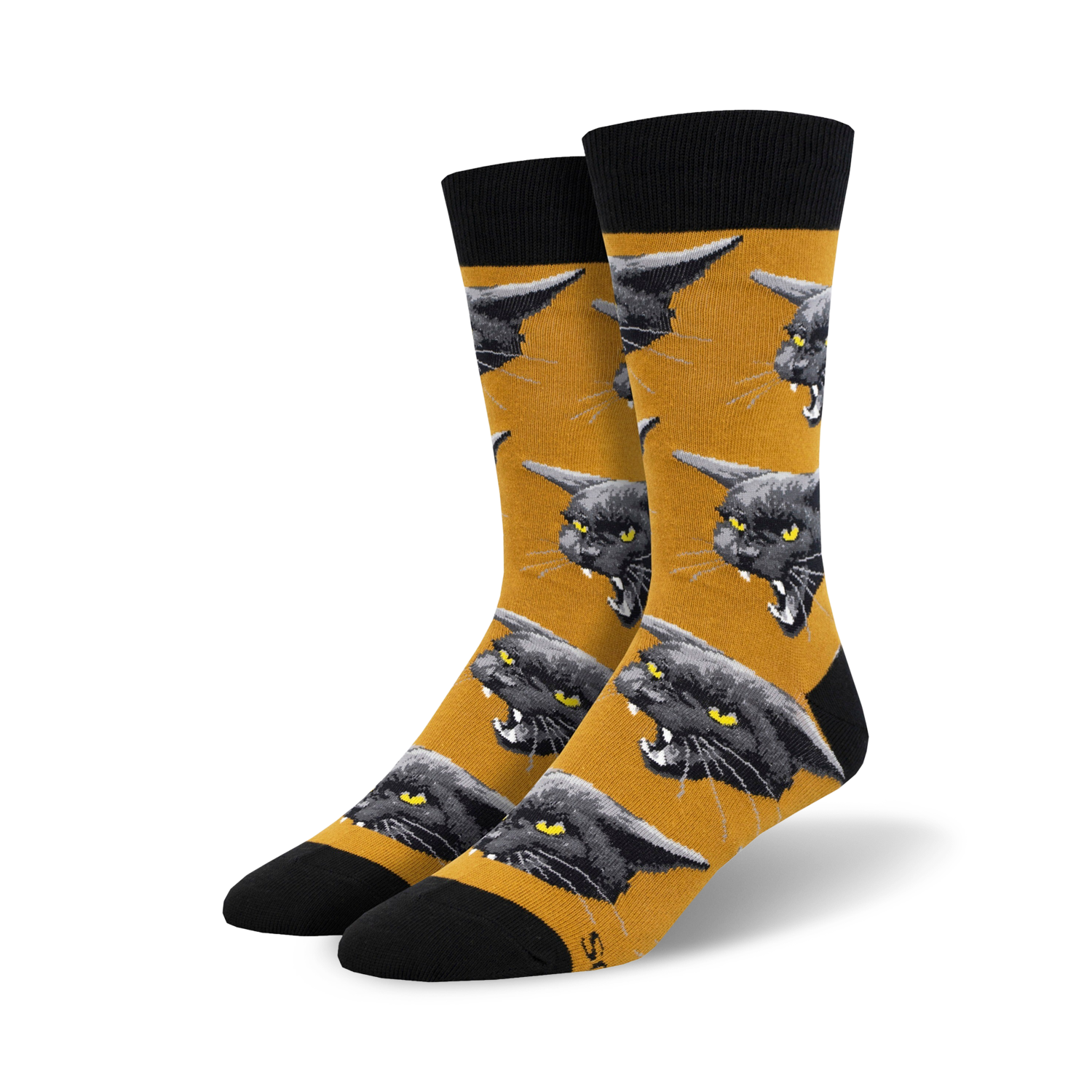 Close-up of Black Cat Malice socks on a mustard yellow background; showcasing the grumpy cat design.