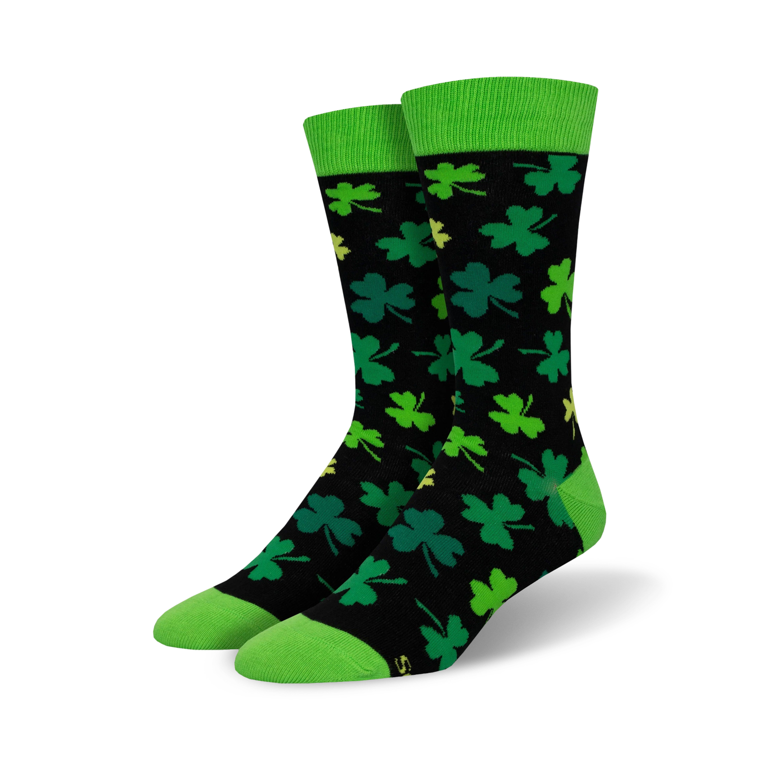 A pair of black crew socks with green shamrocks and lime green cuffs. The socks have a fun, playful design perfect for St. Patrick's Day.