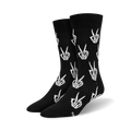 Pair of black crew socks with a repeated pattern of white skeleton hands making peace signs.