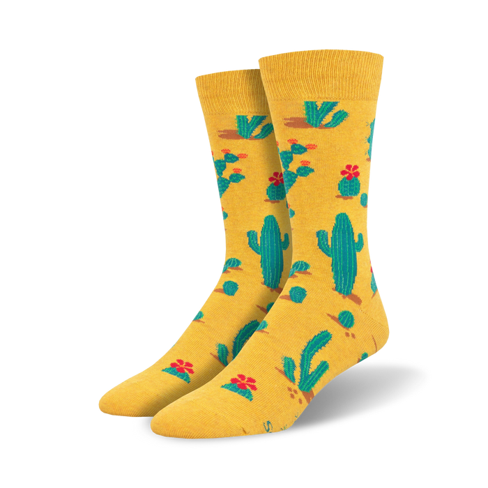  crew length men's socks with a pattern of green cacti and red flowers on a yellow background.   
