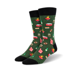 Lifestyle shot showing the green 'Tailgaters Delight' socks on a person's feet; the socks are styled with casual pants.