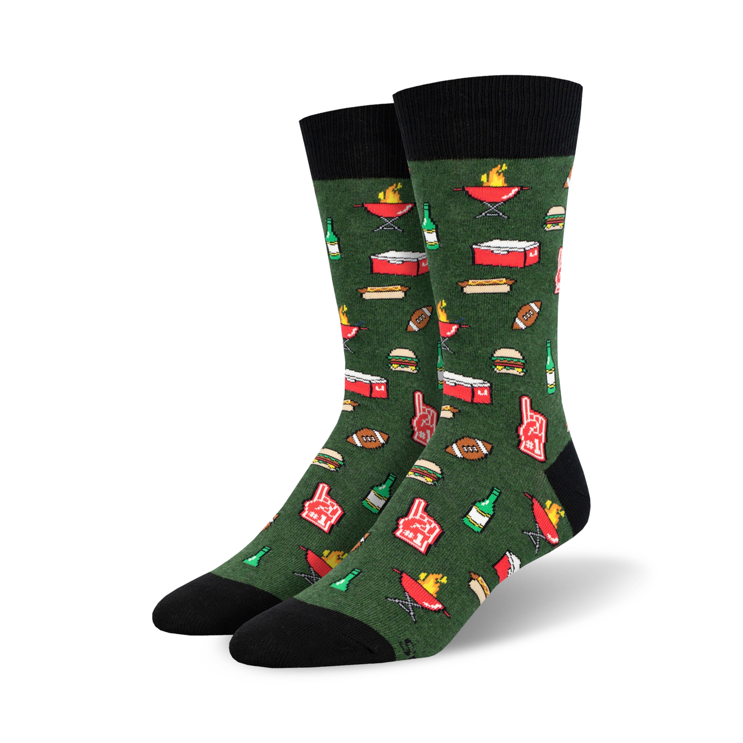 Lifestyle shot showing the green 'Tailgaters Delight' socks on a person's feet; the socks are styled with casual pants.