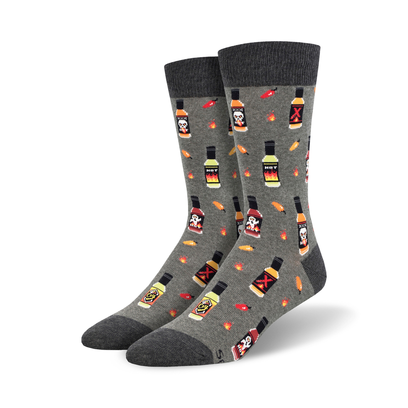 Pair of crew socks in gray and black, featuring a repeating pattern of hot sauce bottles, chili peppers, and skull graphics.
