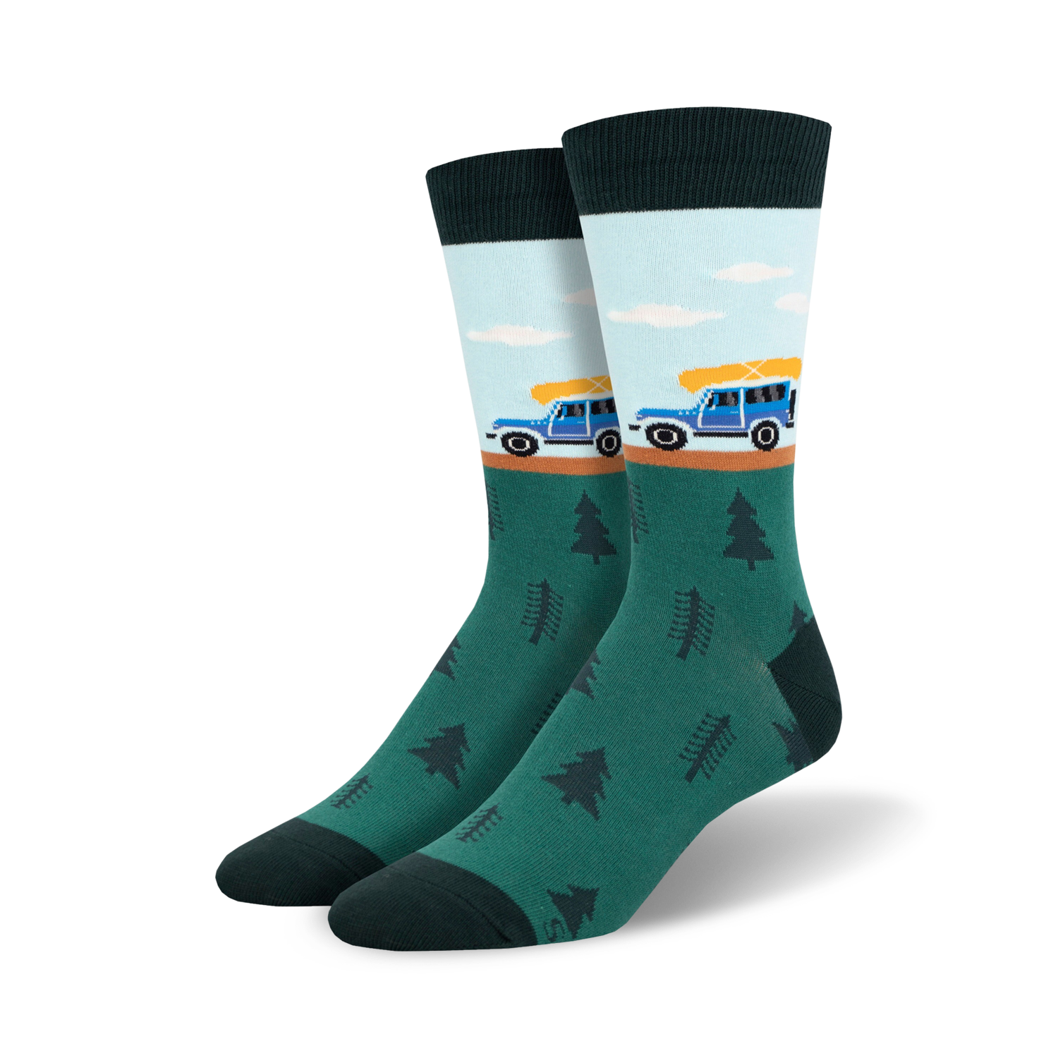 Crew socks in teal, light blue, and dark green. Design features a blue jeep carrying a yellow canoe and small pine trees.