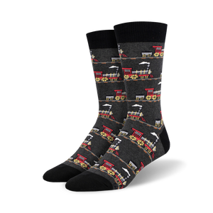 crew length black socks for men with a red and yellow steam locomotive print on a gray background.  