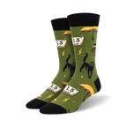 Pair of crew socks in olive green and orange, showcasing a fun, pixelated design of black cats, Friday the 13th calendars, and yellow umbrellas.