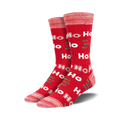 Pair of crew socks in red and green, featuring a repeated 'Ho Ho Ho' pattern. 