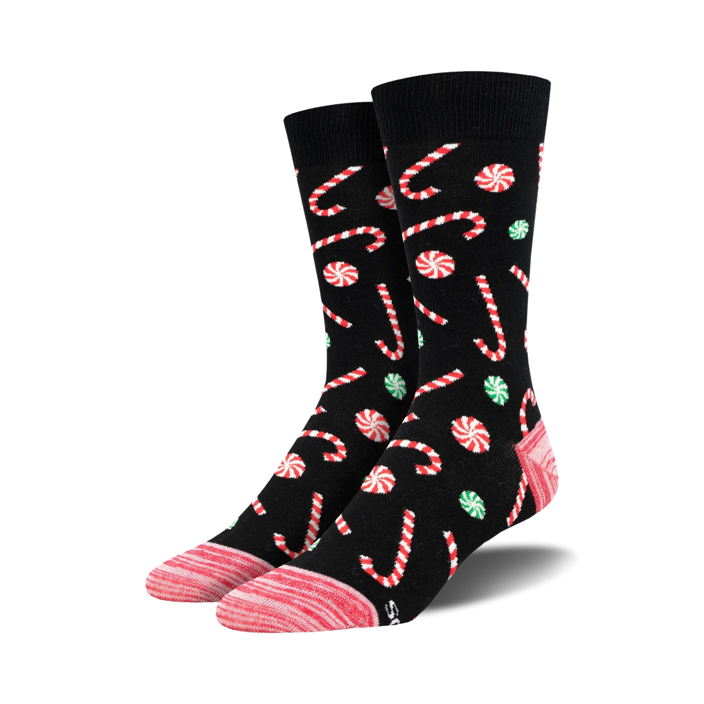 Pair of crew socks with a black background, adorned with red and white candy canes and green and red peppermint swirls.