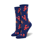 A pair of women's crew socks in navy blue.  The socks are covered in a pattern of red lobsters and orange crabs.