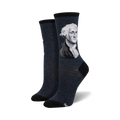 Pair of navy blue crew socks featuring a grayscale portrait of George Washington.  The socks have a black cuff.