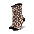 Pair of cream and brown crew socks featuring a giraffe print pattern.  Socks have black toe and heel.
