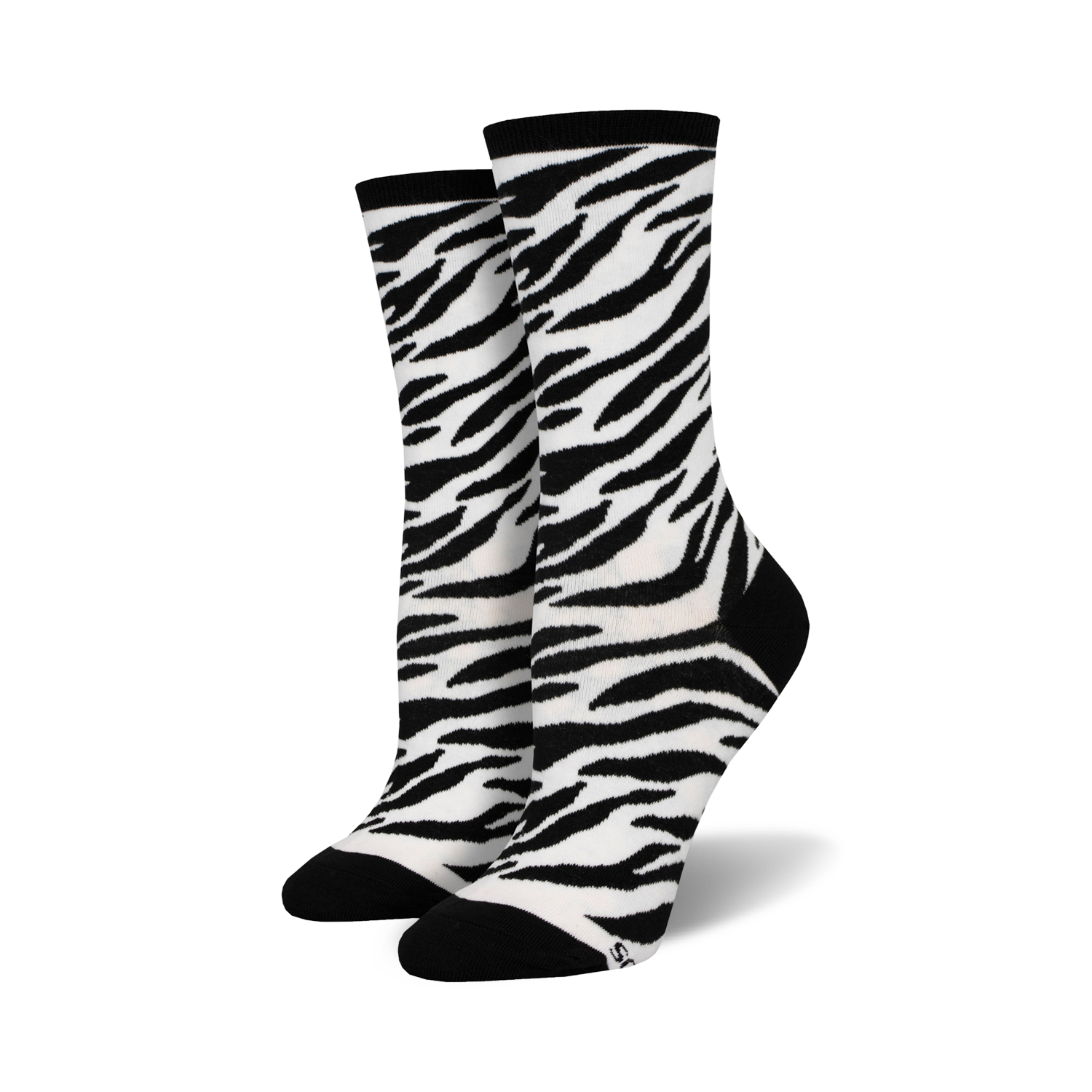 Pair of women's crew socks in a black and white zebra print. The socks have black heels and toes.
