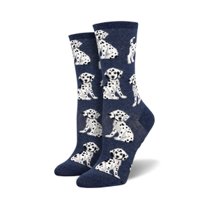 crew length women's socks feature a pattern of cartoon dalmatian puppies.   