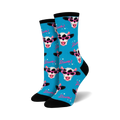 Pair of crew socks featuring a whimsical cow wearing sunglasses on a bright blue background. The words 'Diva!' are scattered throughout.