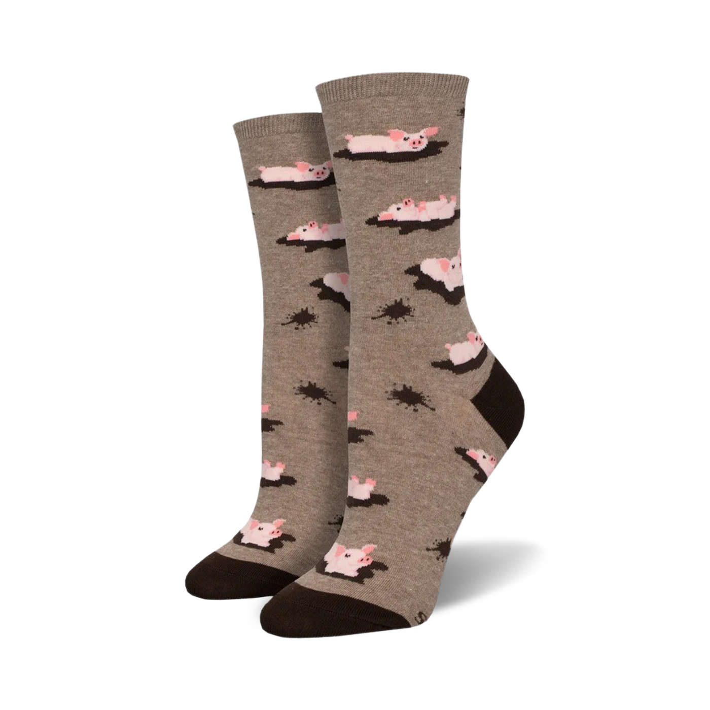 Pair of taupe crew socks with a fun design. Pink pigs are shown swimming in brown mud puddles against a taupe background.  Brown heel and toe.
