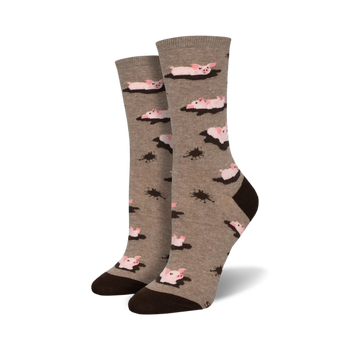 womens mid-calf crew socks with cartoon pigs laying in mud puddles.   