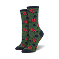 Pair of women's crew socks. Green background with red ladybugs and navy blue polka dots.  Dark navy blue cuffs.