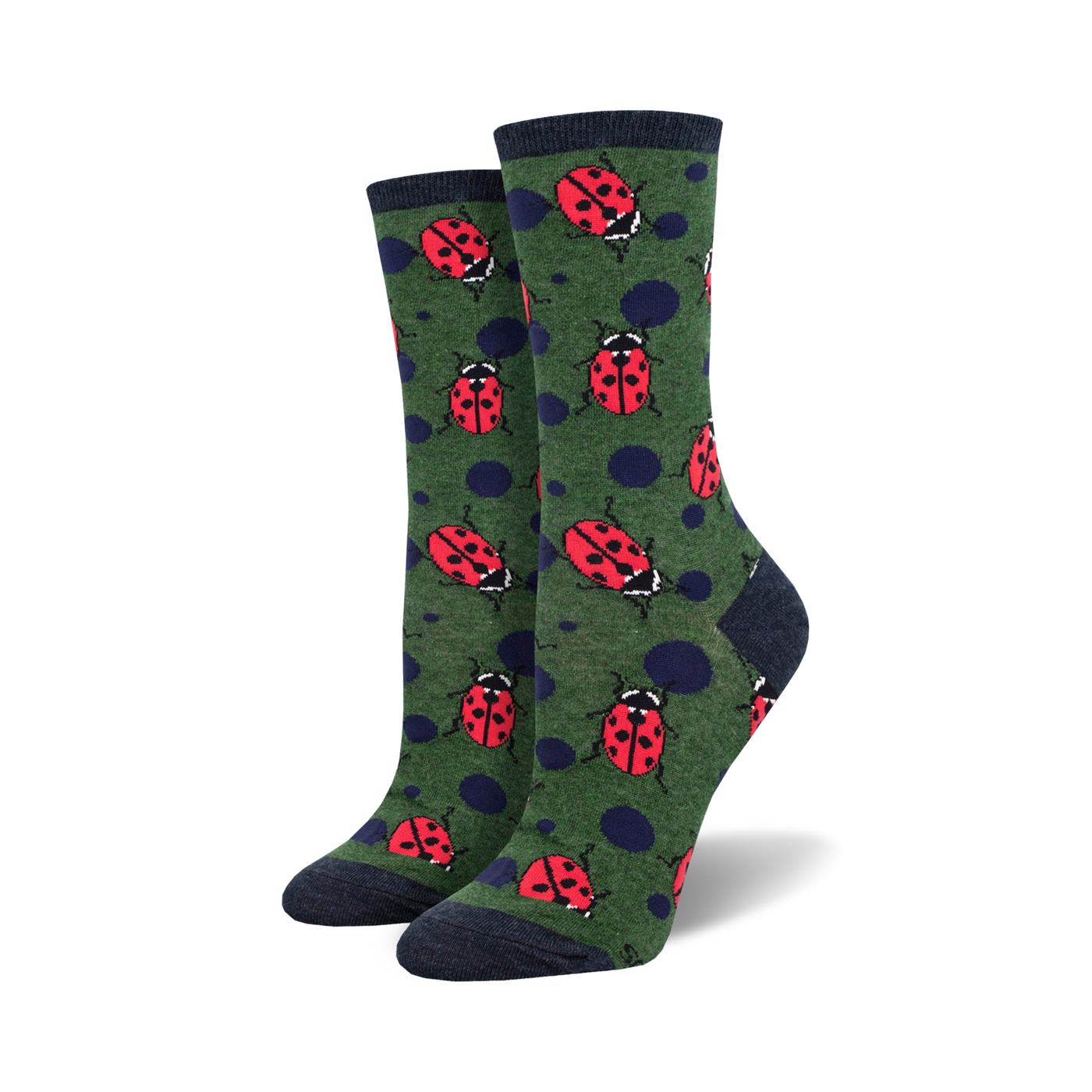 Pair of women's crew socks. Green background with red ladybugs and navy blue polka dots.  Dark navy blue cuffs.