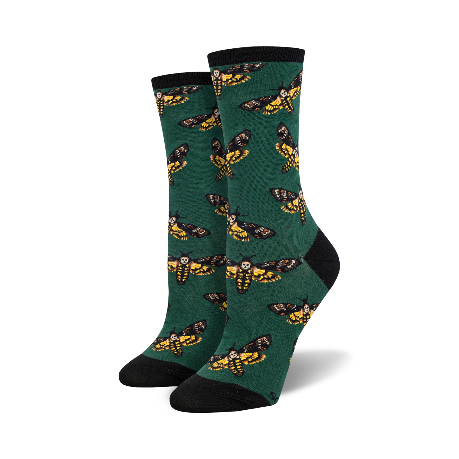 Lifestyle shot:  A person's feet wearing the green 'Moths to a Flame' socks with black cuffs.