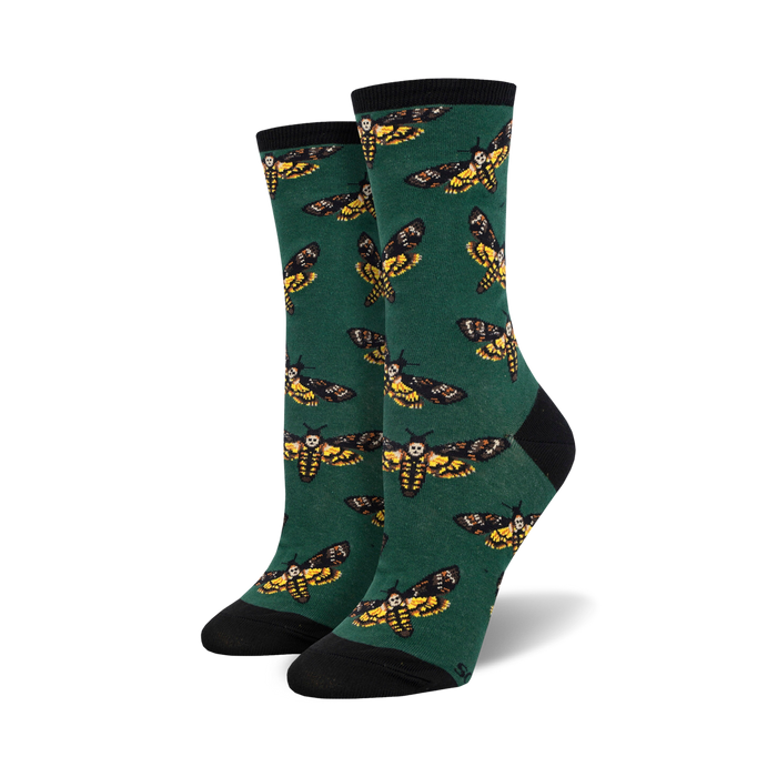 womens moths to a flame crew socks feature a pattern of moths with skull adorned wings.  