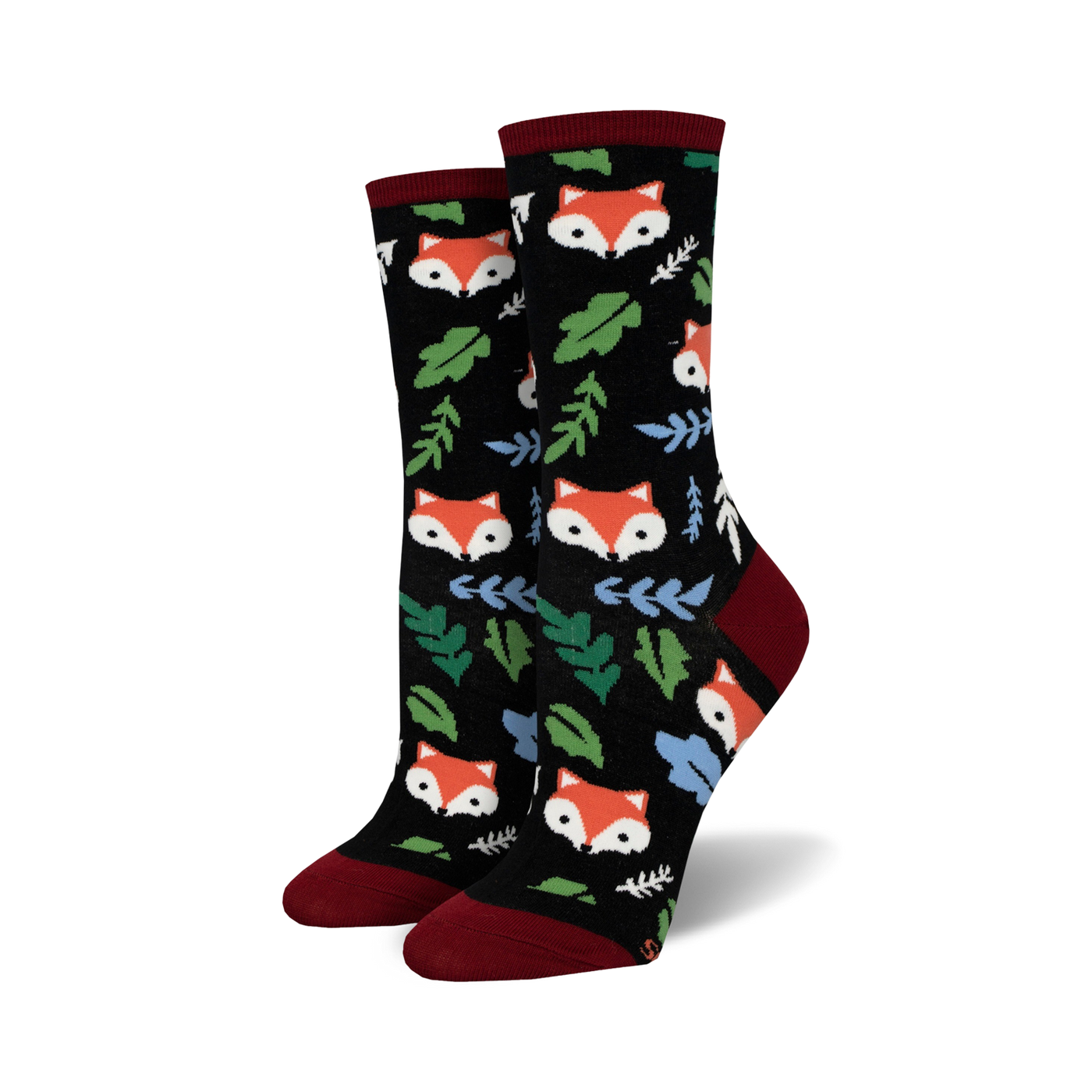 Close-up of black crew socks with foxes and leaves.  Red and green accents.
