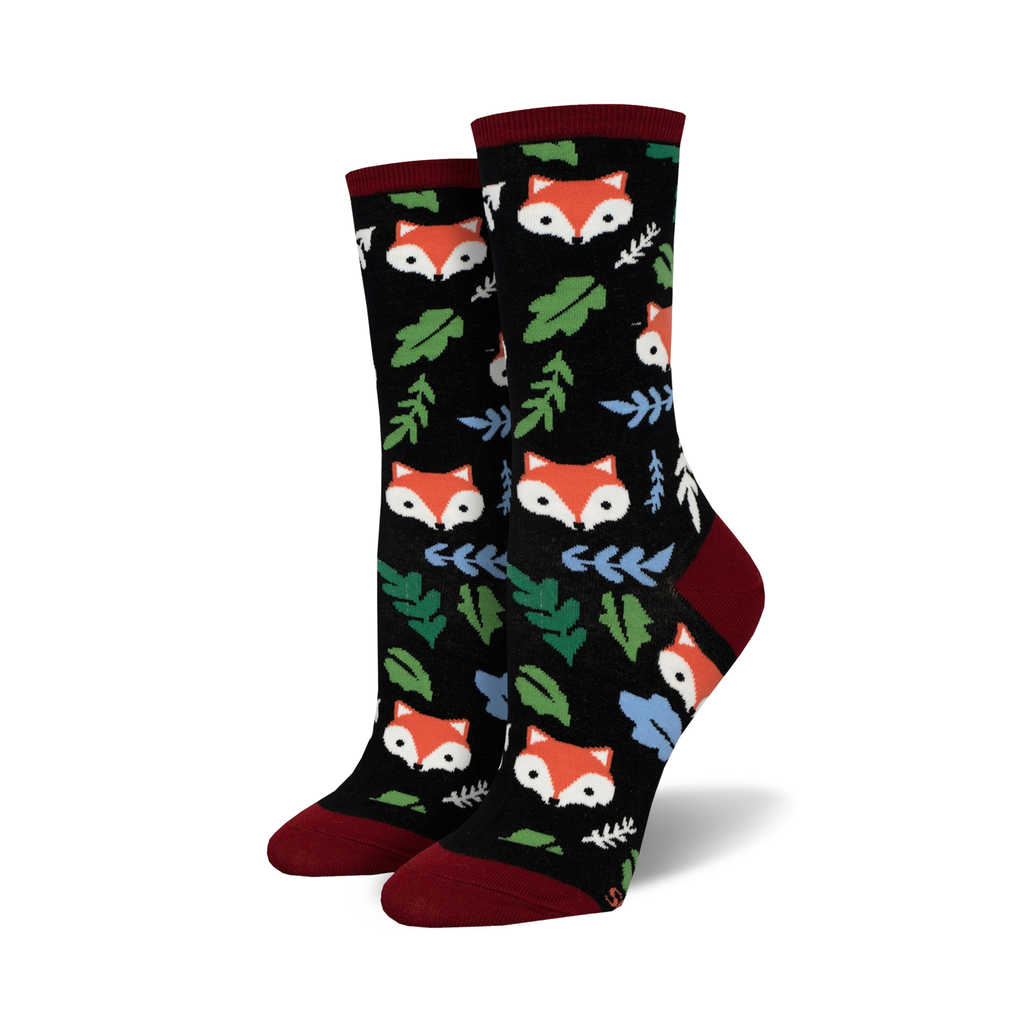 Close-up of black crew socks with foxes and leaves.  Red and green accents.