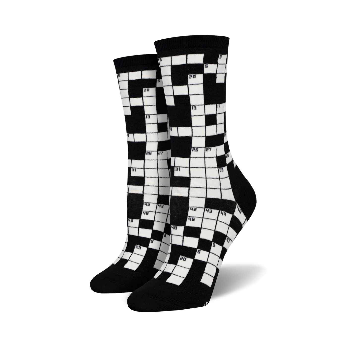 Pair of black and white crew socks featuring a crossword puzzle design.  The numbers are clearly visible against the contrasting background.