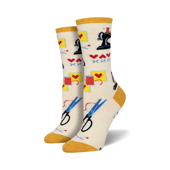 women's sew in love crew socks: colorful sewing-themed pattern on off-white background.   