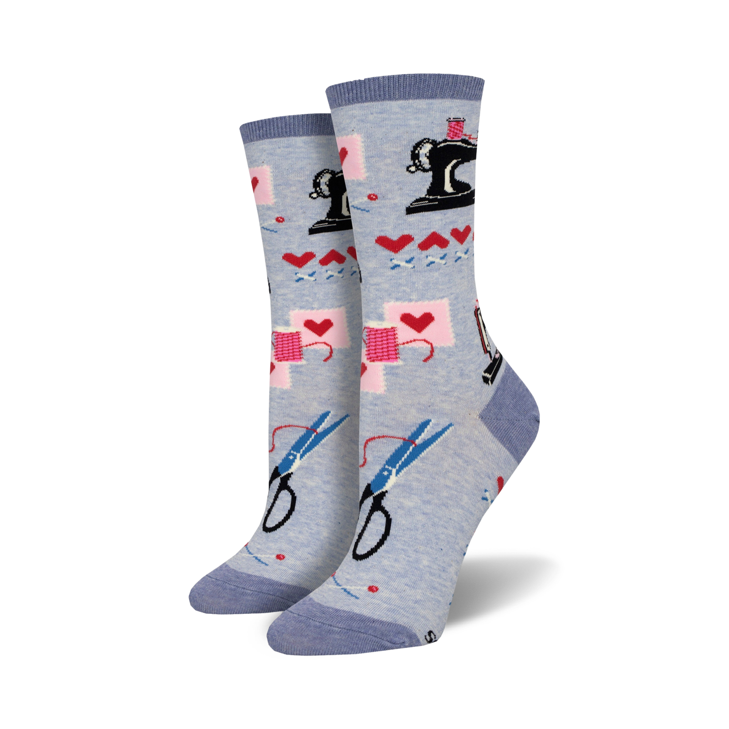 Pair of light blue crew socks with the same sewing-themed design as the main image. Blue cuff.