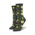 Pair of crew socks in grey with a playful design of lime green pickleballs and paddles. Fun and sporty!