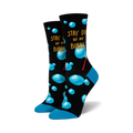 Pair of crew socks with a black background, light-blue bubbles, and the phrase 'Stay Out Of My Bubble'.