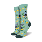 Lifestyle shot showing the teal 'Gin It To Win It' socks on a model's feet, highlighting their fit and pattern.