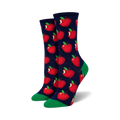 Pair of crew socks with a red apple pattern on a navy blue background and green cuffs. 