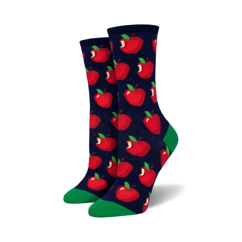 Pair of crew socks with a red apple pattern on a navy blue background and green cuffs. 
