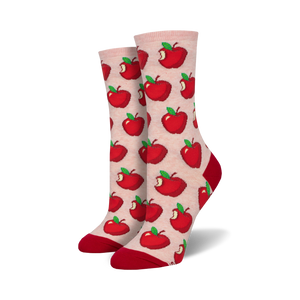 crew socks featuring red apples with bites taken out of them on a pink background are sure to be a delight.  