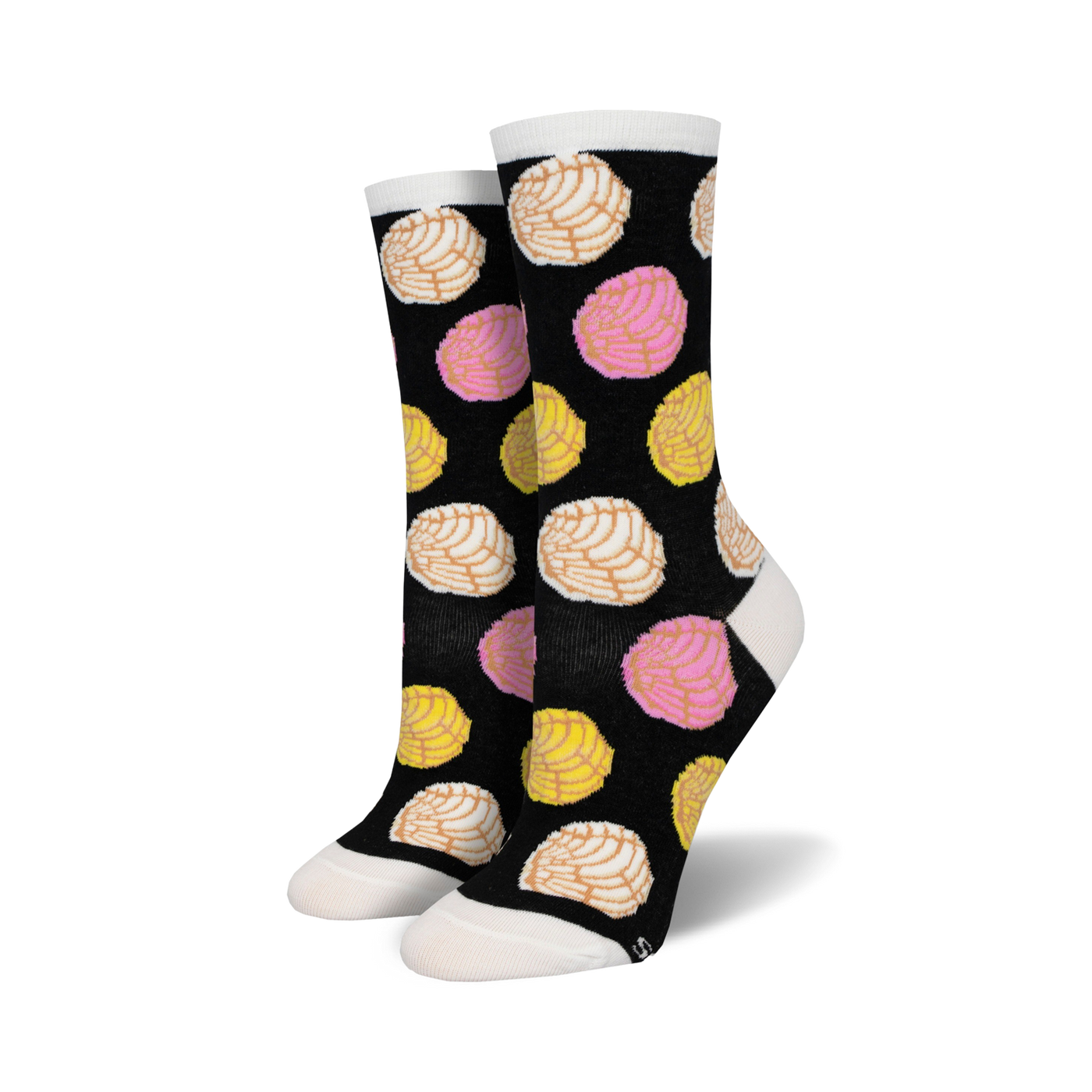 A pair of black crew socks with a fun pattern of colorful pan dulce (conchas) in pink, yellow, and white.