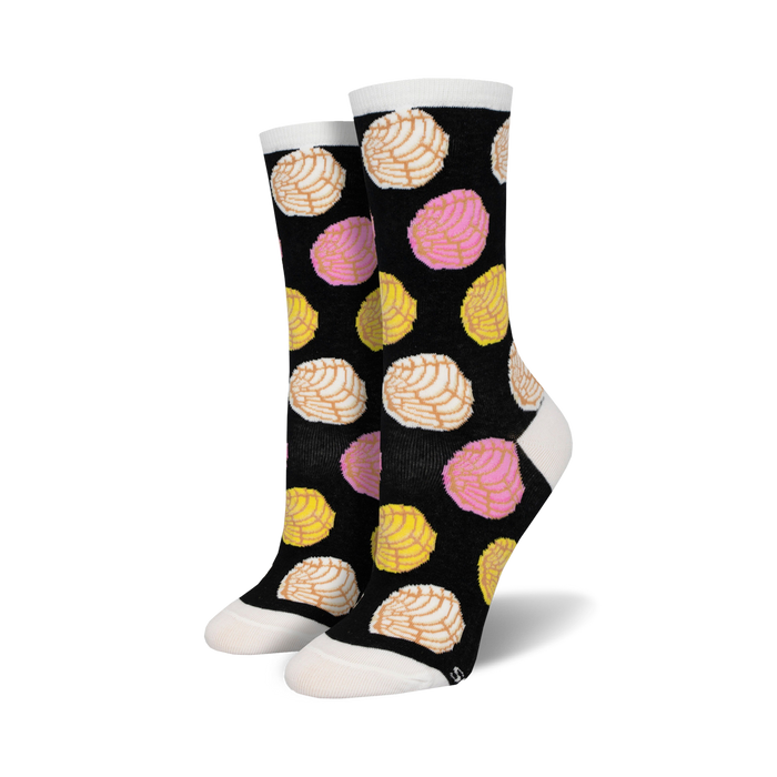 black crew socks with a vibrant pink, yellow, and white concha shell design.    }}