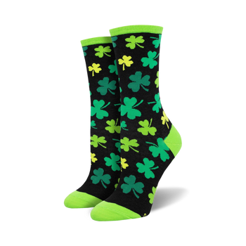 Pair of black crew socks with green and yellow shamrocks. Lime green cuffs. Fun, festive print!