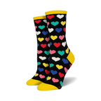 Pair of women's crew socks. Black background with multicolored hearts, yellow cuff.