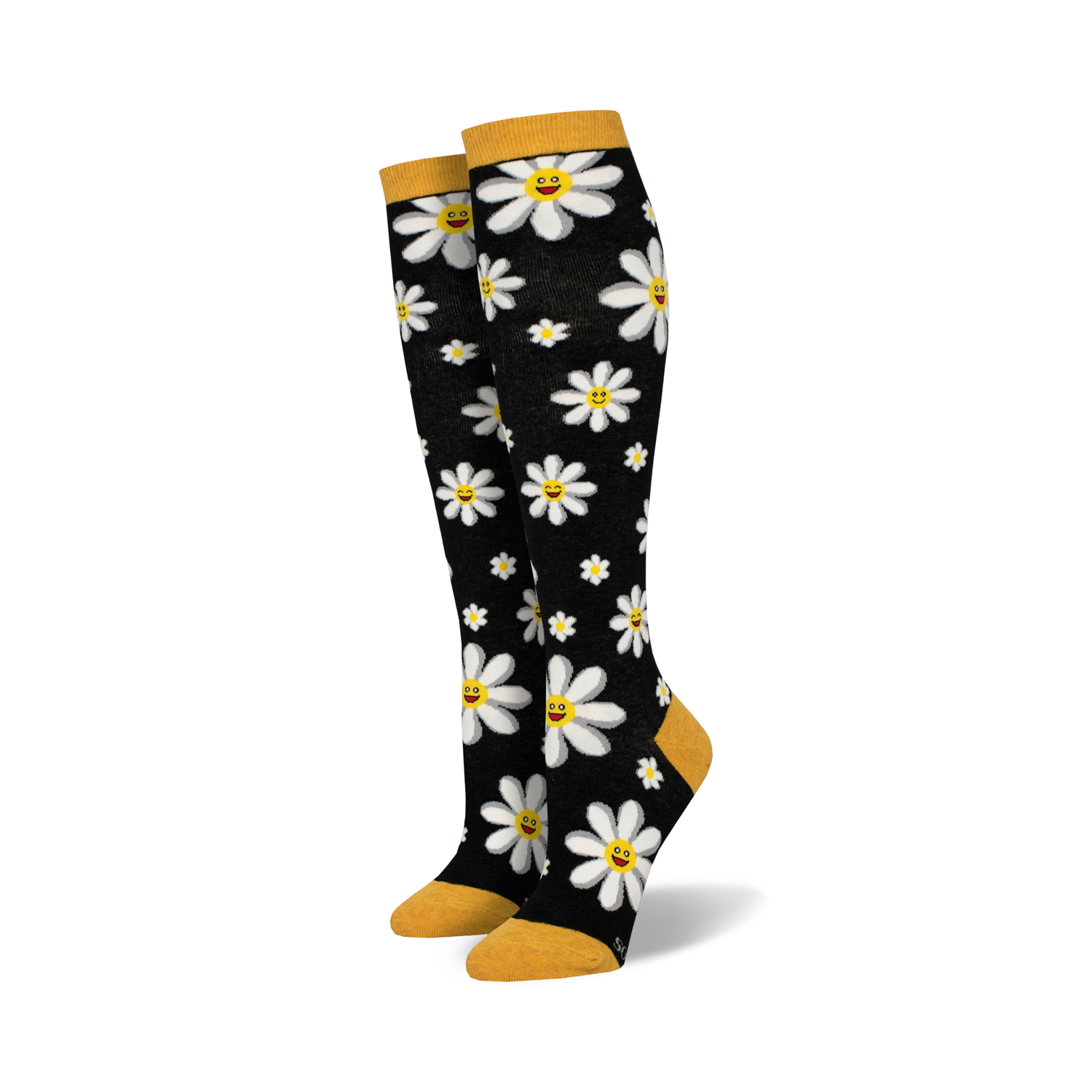 Pair of black knee-high socks with white smiling daisy pattern and mustard yellow cuffs.