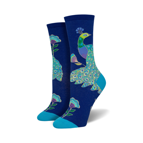 Lifestyle shot showing the navy Intricate Peacock socks on a woman's feet, highlighting the sock's color and design in a real-world setting.