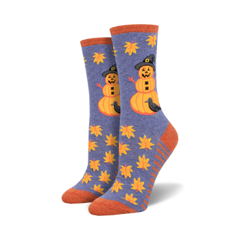 womens halloween-themed crew socks. blue with pattern of fall leaves and pumpkin with witch hat and crow.   