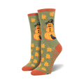 Close-up shot of Pumpkinman socks in olive green showing the detail of the design.