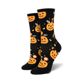 Pair of black crew socks with orange pumpkins, candy corn, and eyeballs.  Fun Halloween design!