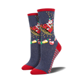 Pair of women's crew socks in navy blue with red accents.  Design features Santa in a sleigh with stars and Christmas treats.