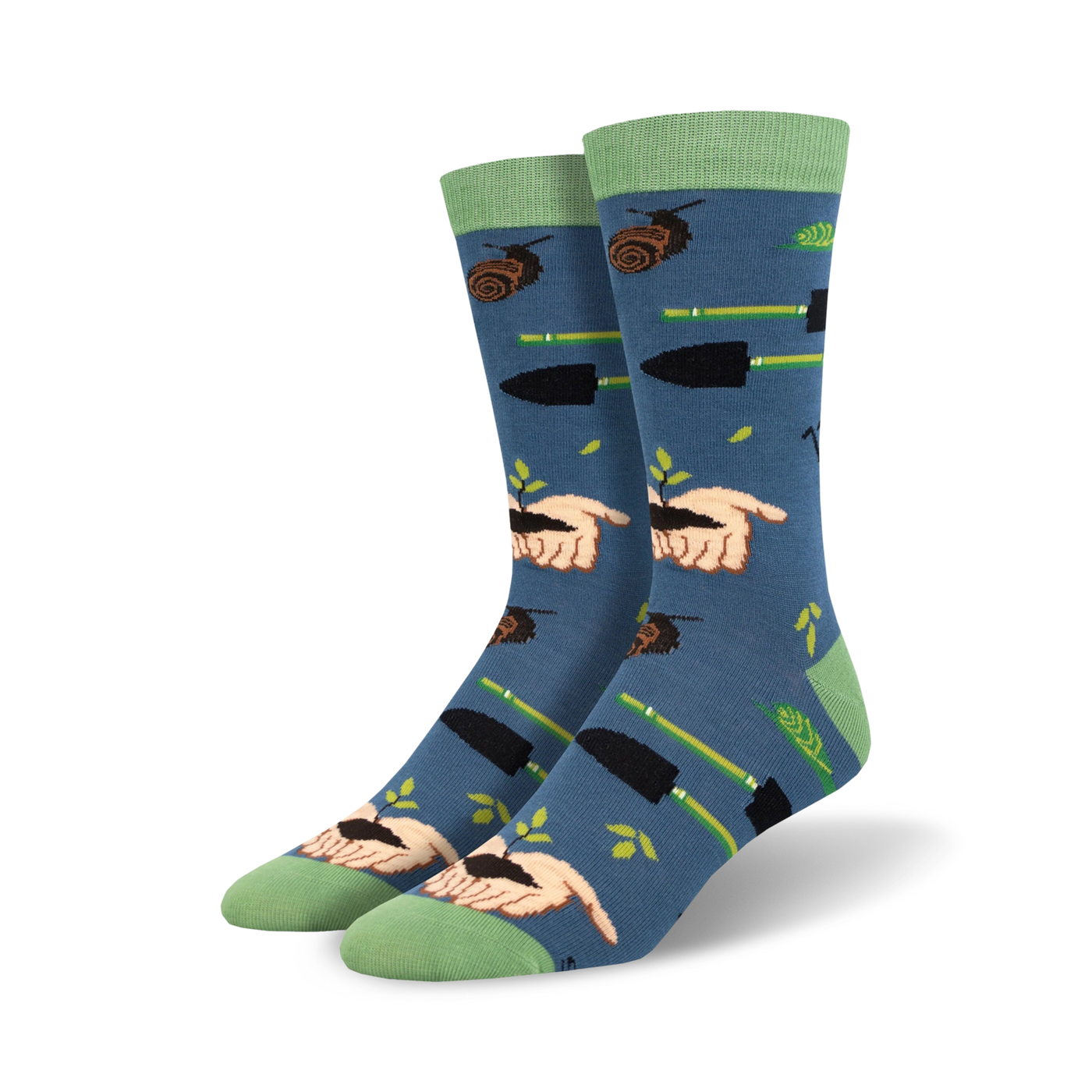 Pair of crew socks in blue with a gardening theme.  Features hands planting seeds, gardening tools, and snails on a soft blue background. Green accents on cuffs.
