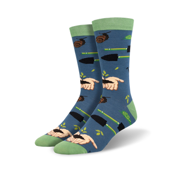 blue crew socks with illustrations of hands holding green plants, bamboo stalks, and gardening tools.   
