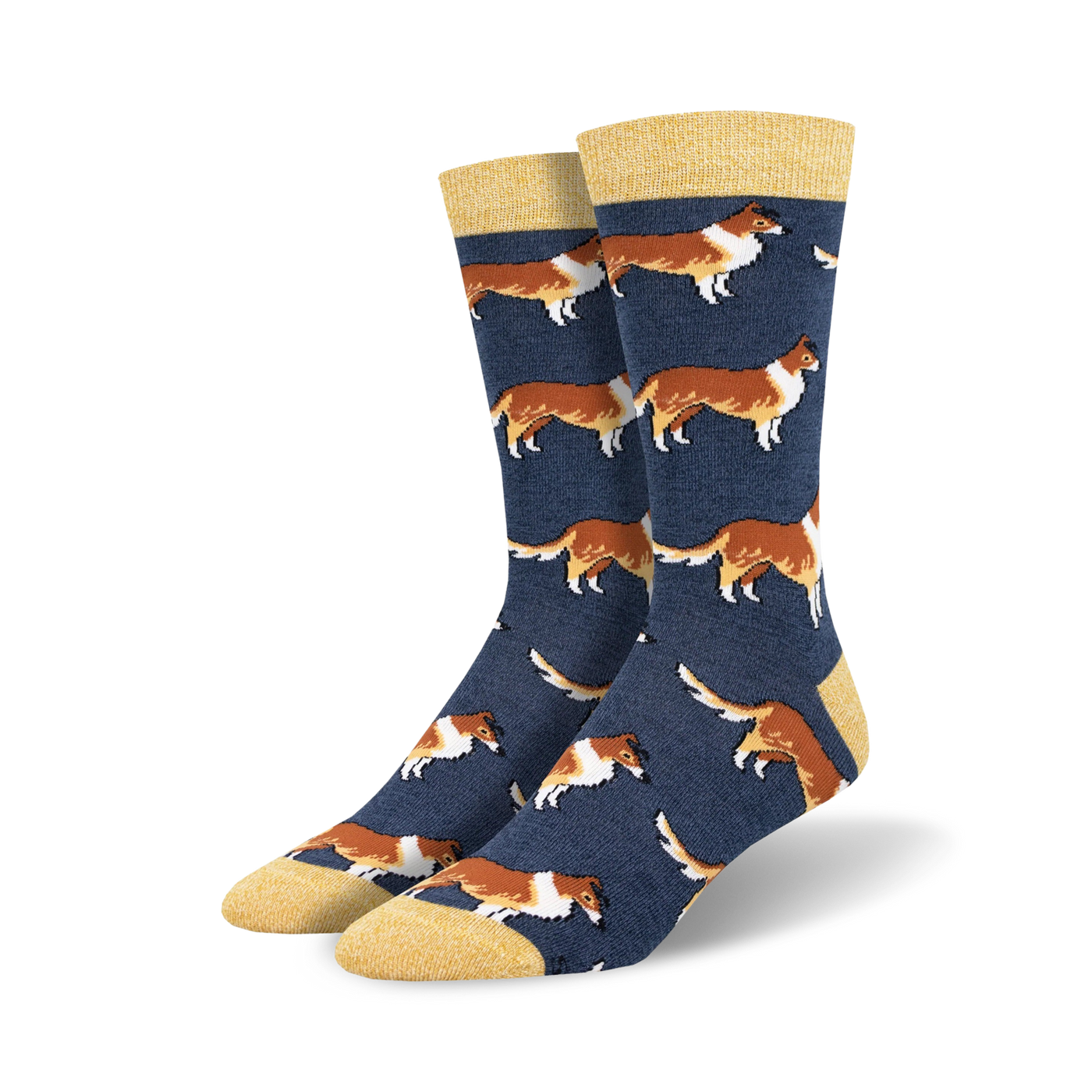 Pair of navy blue crew socks featuring a repeating pattern of brown and white Collie dogs. Socks have a yellow cuff.